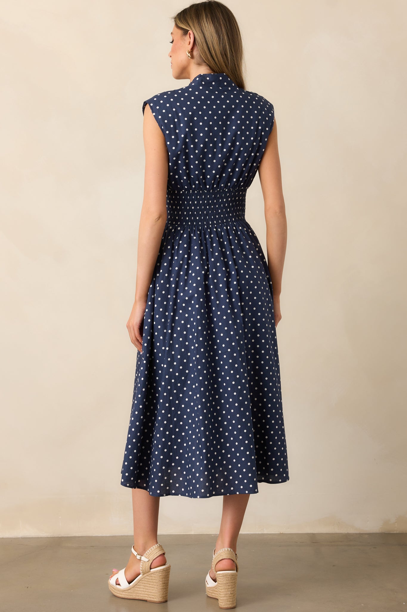 The Evette Navy Polka Dot Zip Front Midi Dress